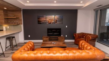 Unwind in Elegance – Spacious Living Area with Stunning Cityscape Views.