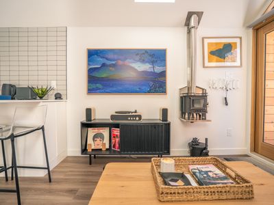 Spin a record or two by the world's cutest wood stove