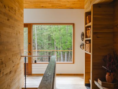 Warm wood tones throughout the entryway