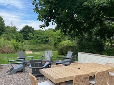 Enjoy the outdoor dining area and fire pit.