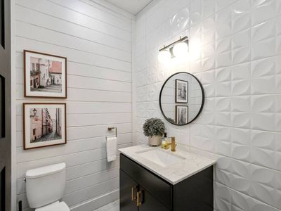 A half bath is also available for guest convenience.