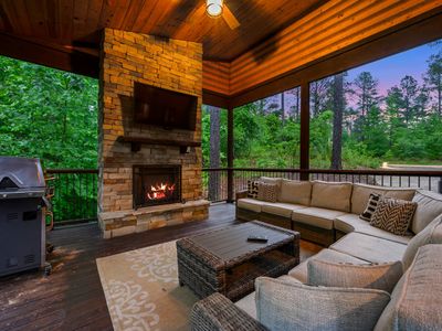 Oversized outdoor sectional around the gas fireplace.