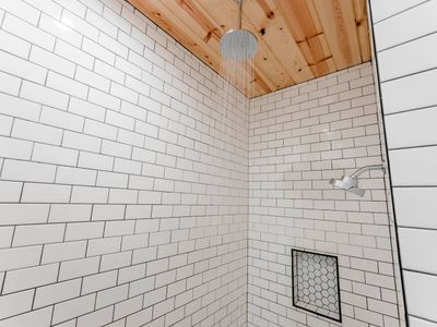 Beautiful walk-in shower with rain head.