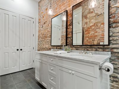 Bathroom with dual sinks perfect for groups