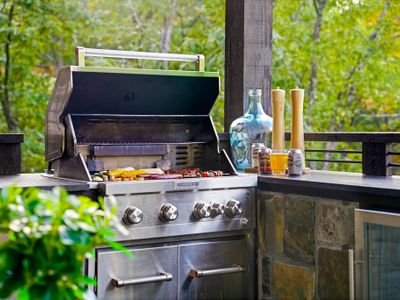There's also a perfect outdoor grilling space designed for good food, great company, and gorgeous views.
