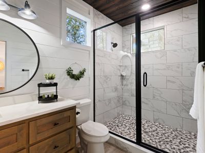 The private bathroom with a walk-in shower.