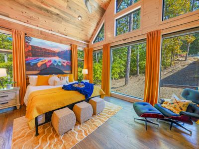For the outdoor enthusiast of the group, adventure meets elegance in this colorful kayak-inspired sanctuary.
