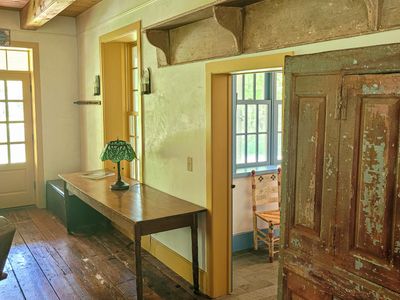 Rustic wood floors and details throughout the farmhouse