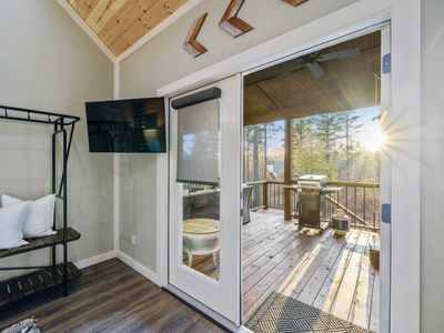 The door leads straight to the covered patio. Enjoy the hot tub steps from bed!