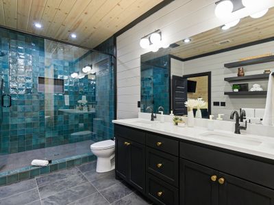 A double vanity and walk-in shower!