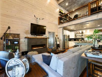 The living room seamlessly connects to the kitchen.