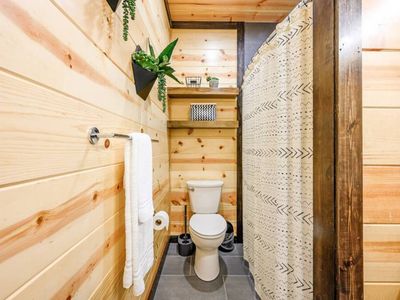 Full bathroom attached to Upstairs King Bedroom 3.