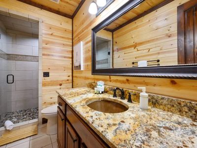 This private bathroom features a walk-in shower.
