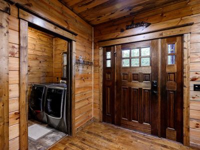 Laundry is located off the kitchen.