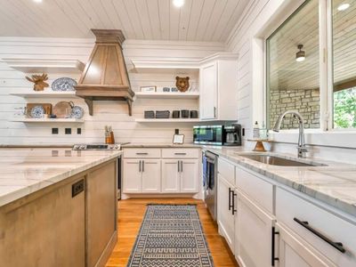 The kitchen has updated appliances and ample counter space.