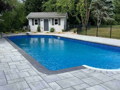 Enjoy long, lazy summer days lounging in the pool.

*** Please know there is no pool furniture available at this time.