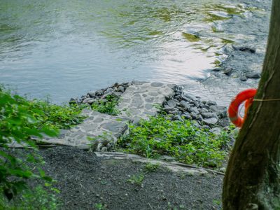 A private dock, made from natural stone pulled from the creek bed.