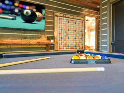 Challenge your crew to a night of friendly competition in this spacious entertainment haven.