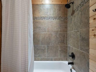 Shower/tub combo.