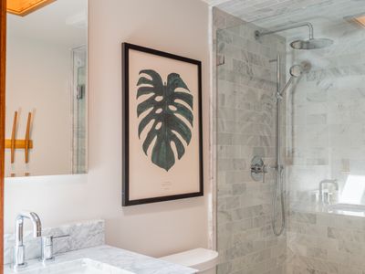 Enjoy the rain shower and skylight in this tranquil bath.