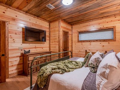 Equipped with an HDTV and a full bathroom to share with King Bedroom 2.