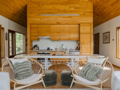 open concept kitchen with seating for 12