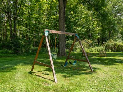 This play set is perfect for kids, with a place for parents to relax close by.