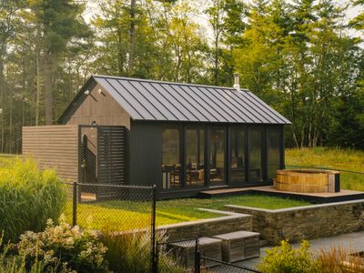 The Pool House with outdoor shower located just to the left of the Main House