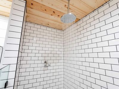 Beautiful walk-in shower with rain head.