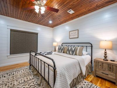 This room features a King Bed set with a premium mattress and luxury linens