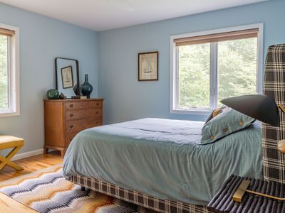 The second bedroom with a queen mattress.