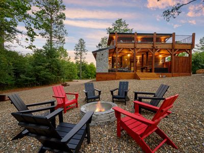 Firepit with Adirondack chairs.