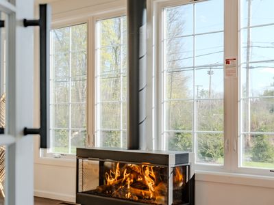 This gas fireplace fills the sun room with warmth and creates a cozy ambience immediately upon stepping into the home.