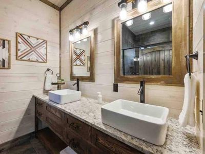 The final master bathroom has a double vanity and walk-in shower!