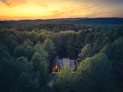 Aerial view of cabin at sunset