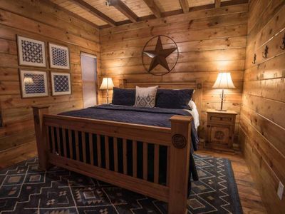 Downstairs you will find a third  bedroom with a King sized bed.