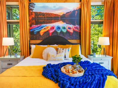 Colorful kayak décor adds a splash of excitement to this warm, welcoming space.
