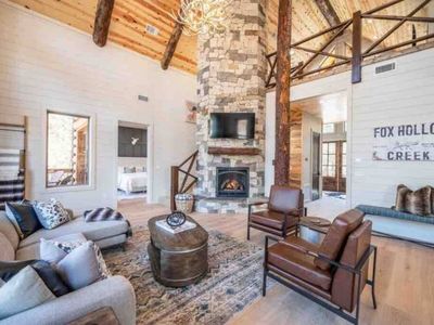 The center of the room is the gas fireplace and tv!