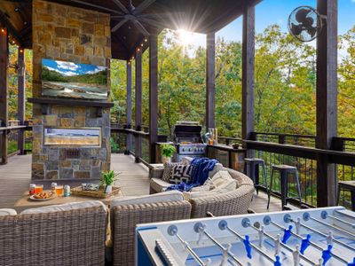 The magic of Glass and Timber truly unfolds when you step onto the expansive outdoor deck, where warm timber beams frame gorgeous views of the surrounding trees.