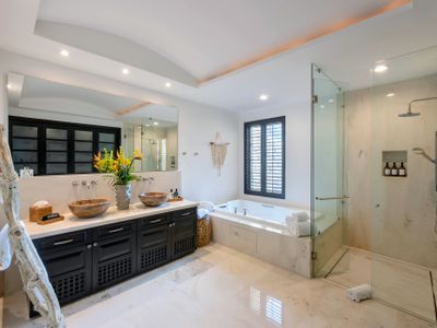 Double Vanity, Jetted Tub, Spacious Marble Shower, and Spa-Grade Toiletries