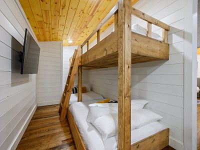 Upstairs you will find the bunk room with 4 twin beds and 4 full beds.