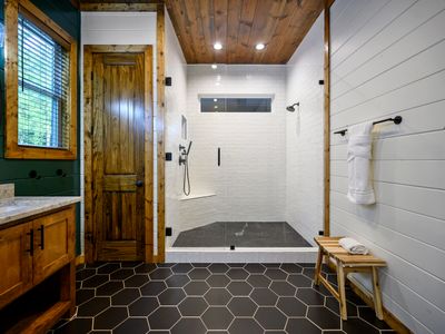 The private full bathroom with double vanities and a walk-in shower!