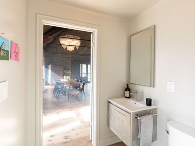 A view from the half bath into The Rifton's sunlit great room.