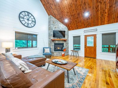 The fireplace & tv are the anchors of the living area, ensuring entertainment!