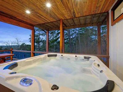 A 6-seater hot tub on the bottom deck!
