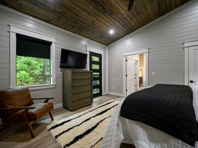 Main level Master Suite #5 w/private access to outdoor siting area!