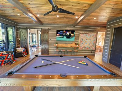 Family fun starts here in the cozy-cool game room designed to keep the fun going no matter the weather.