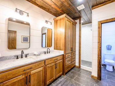 Private Bath with a double vanity and walk-in shower.
