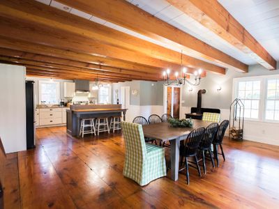 Beautiful hard wood floors and beams are present throughout the house.