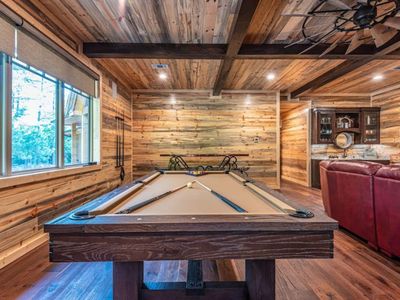 The pool table in the game room.